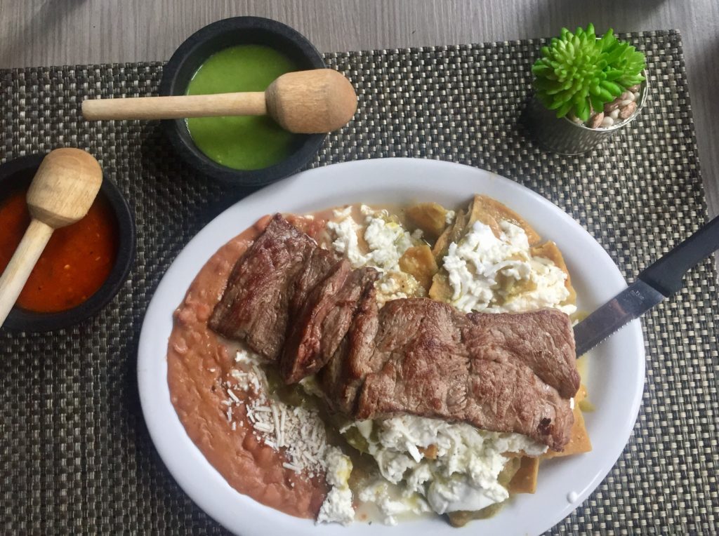 Grilled steak with chilaquiles